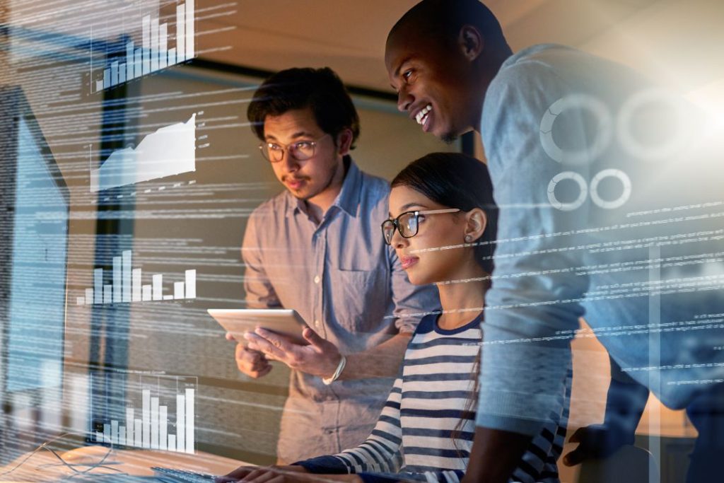 image of a three people working with infor software solutions